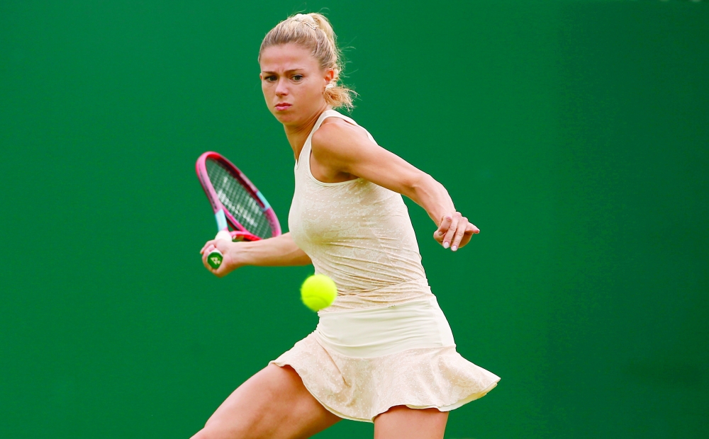 Italy's Camila Giorgi in action against Czech Republic's Karolina Pliskova. -- Reuters 