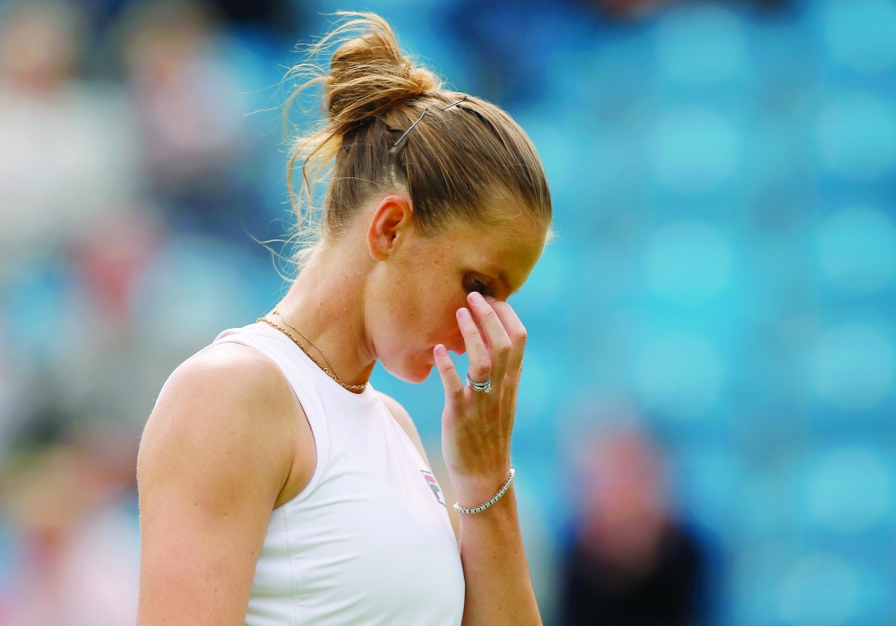 Czech Republic's Karolina Pliskova reacts during her match against Italy's Camila Giorgi. -- Reuters 