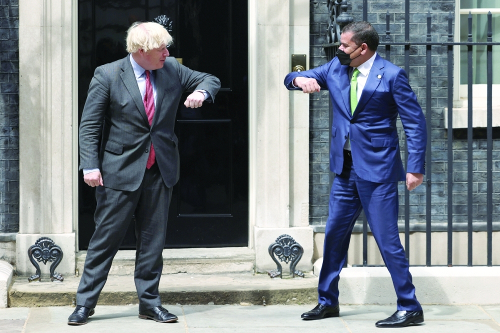 Britain's Prime Minister Boris Johnson meets Libya's Prime Minister Abdulhamid Dabaiba at Downing Street in London, on Thursday. — AFP