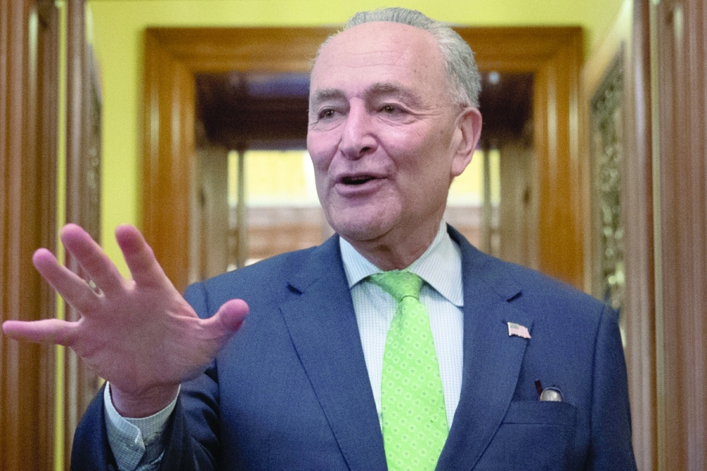 Senate Majority Leader Chuck Schumer (D-NY) speaks to news reporters following the announcement of a bipartisan deal on infrastructure in Washington. - Reuters 