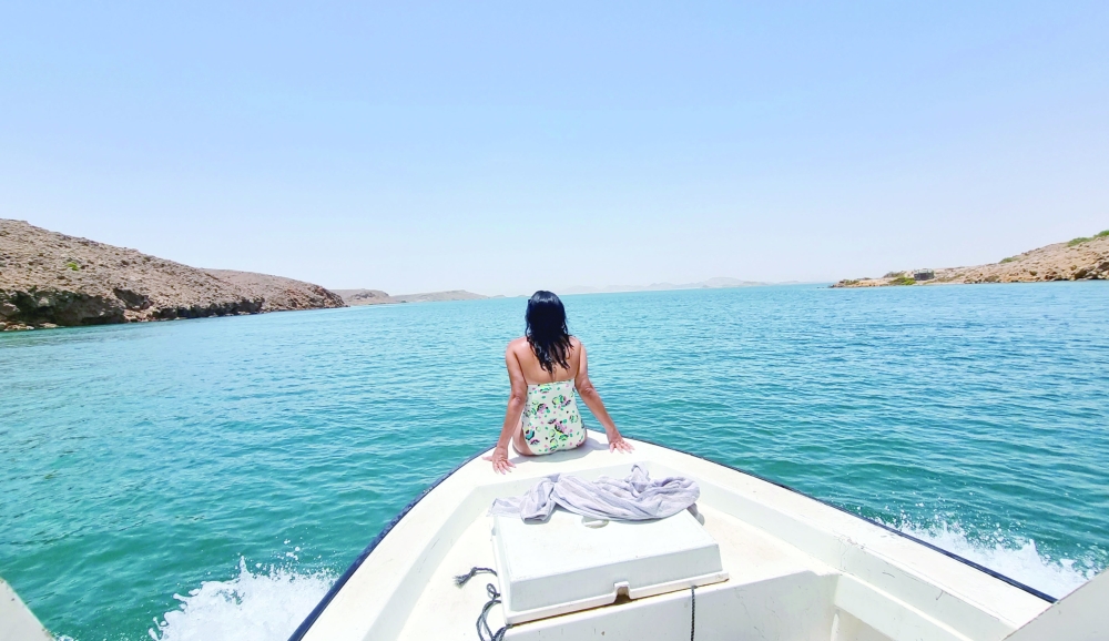 Exploring the khor via boat