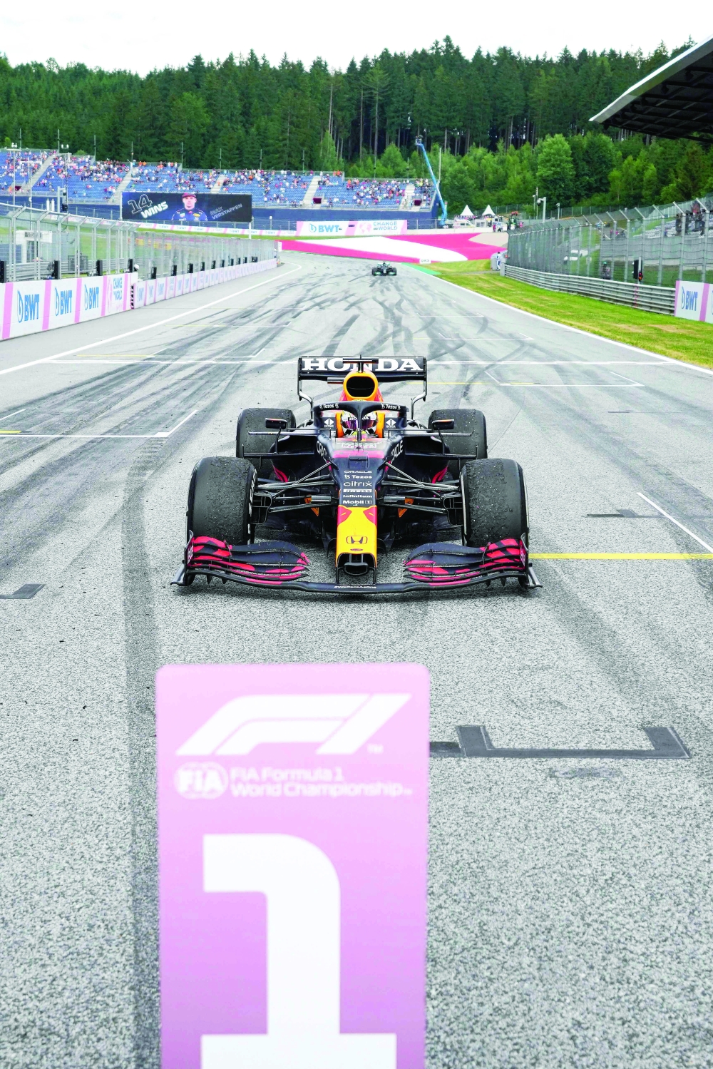 Winner Red Bull's Dutch driver Max Verstappen takes his position after the Formula One Styrian Grand Prix at the Red Bull Ring race track in Spielberg, Austria, on June 27, 2021. / AFP / POOL / Darko Vojinovic

