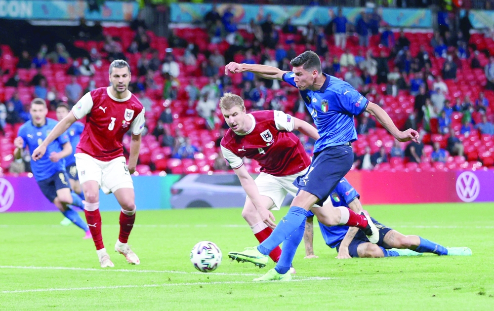 Italy's Matteo Pessina scores their second goal. -- Reuters