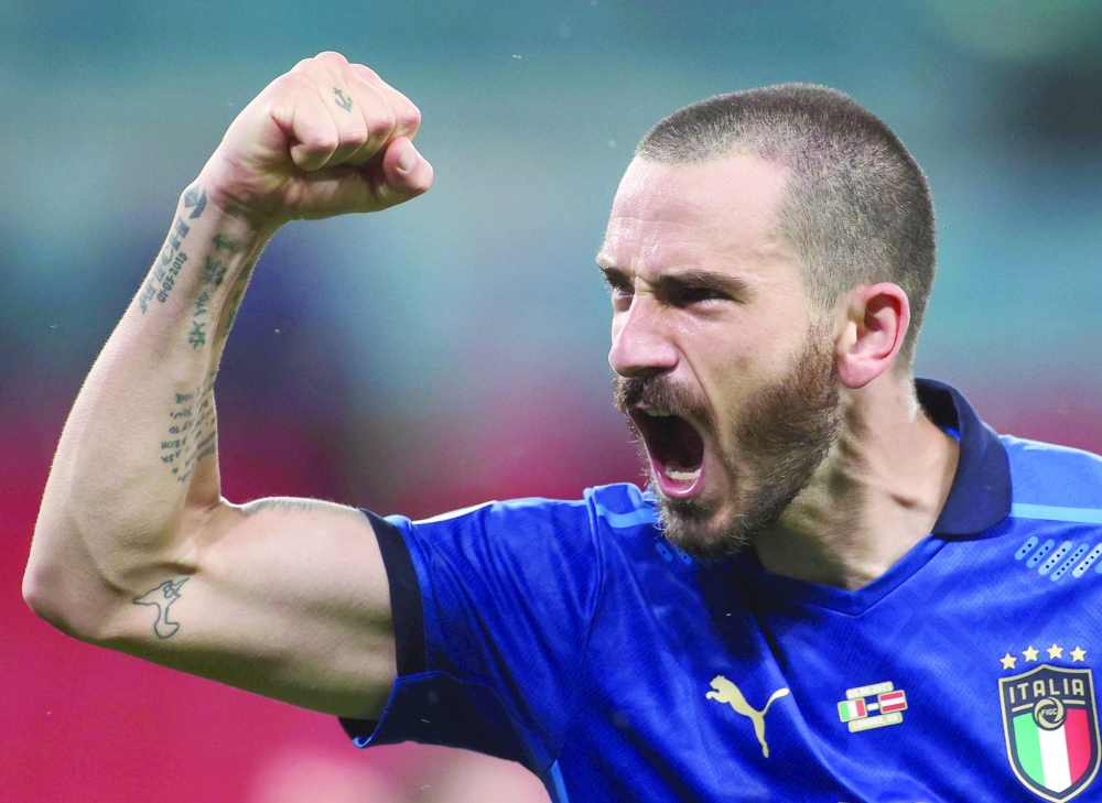 Italy's Leonardo Bonucci celebrates after the match. -- Reuters