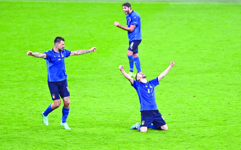 Italy's Jorginho celebrates after the match. -- Reuters