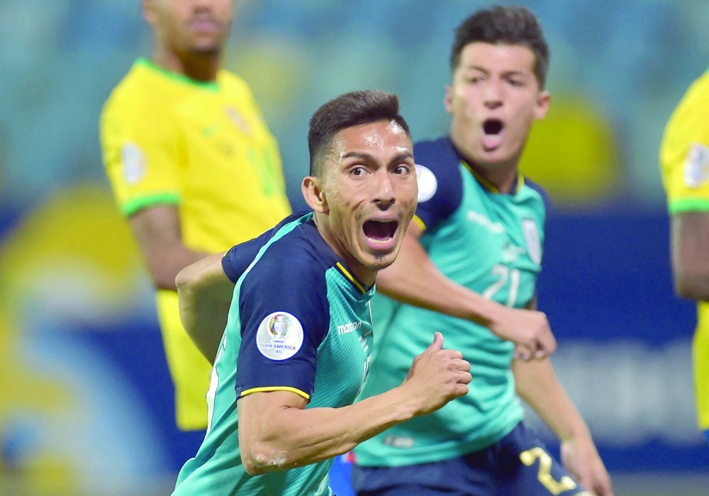 Ecuador's Angel Mena celebrates after scoring against Brazil. -- AFP