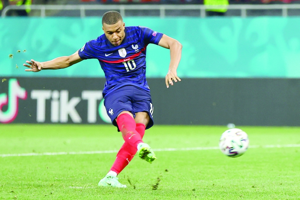 France's forward Kylian Mbappe fails to convert a penalty. -- AFP