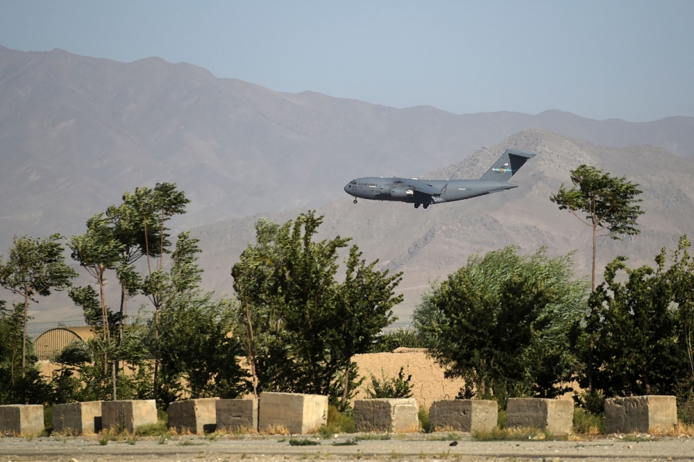 A US Air Force transport plane lands at the Bagram Air Base in Bagram on July 1, 2021.