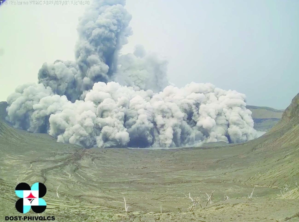 A phreatomagmatic eruption plume billows from Taal volcano, Batangas province, Philippines in this screen grab obtained from a social media video. - Reuters 