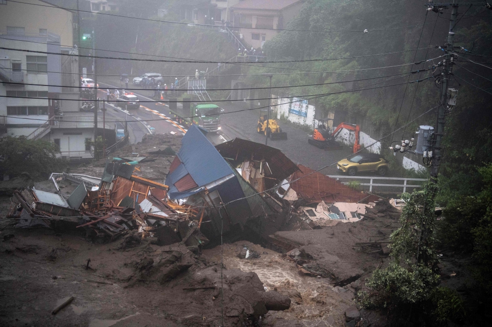 A general view shows mud and debris at the scene of a landslide following days of heavy rain in Atami in Shizuoka Prefecture on July 3, 2021. 