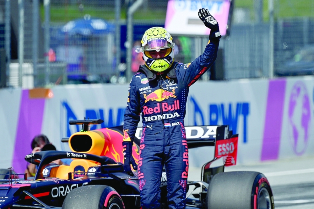 Red Bull's driver Max Verstappen reacts after winning the qualifying session at the Red Bull Ring race track in Spielberg, Austria. -- AFP 