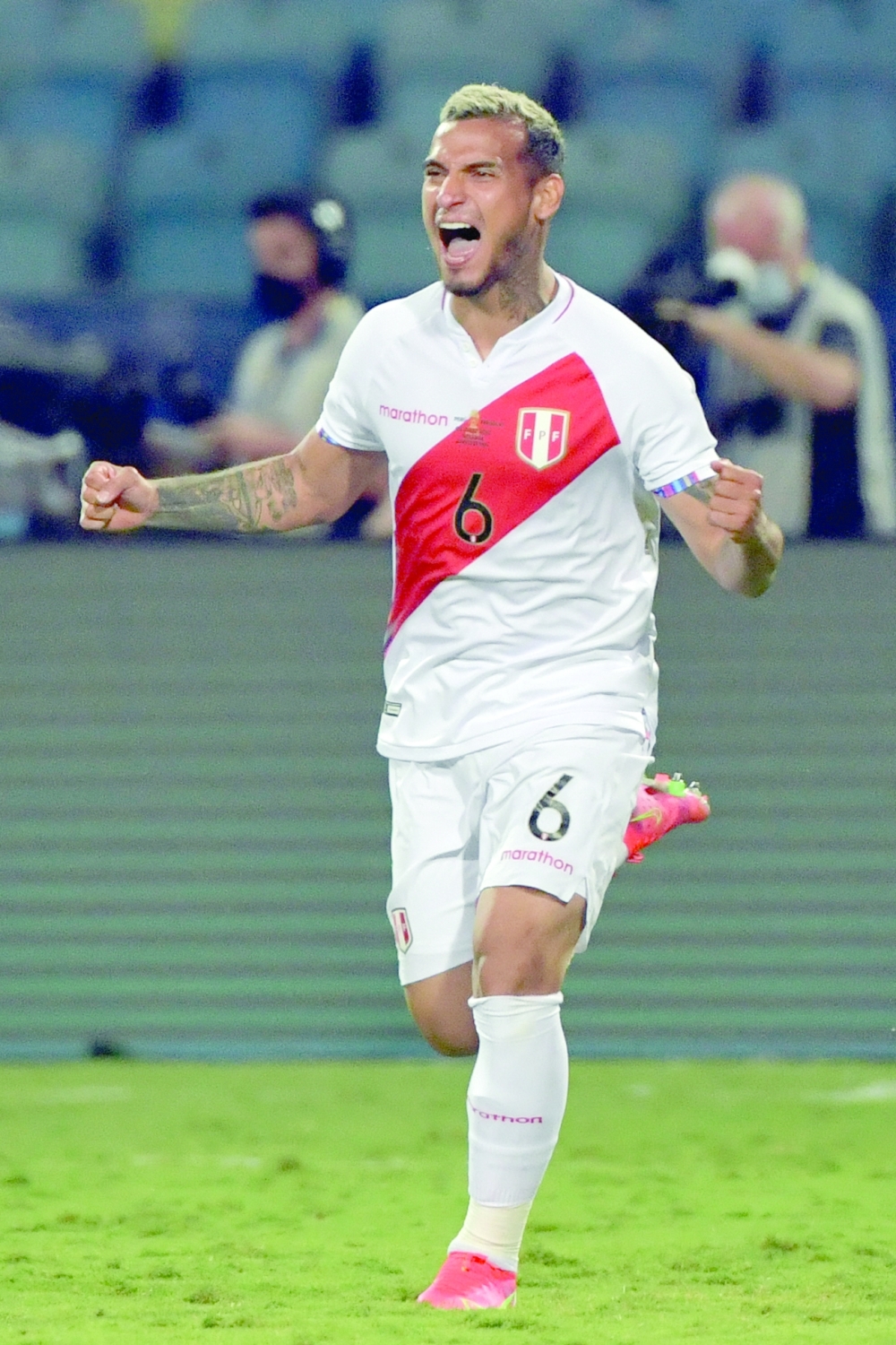 Peru's Miguel Trauco celebrates after scoring the defining goal. -- AFP