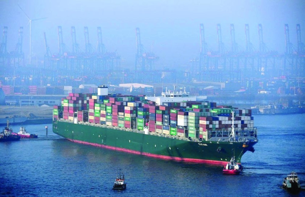 A container ship arrives at a loading terminal of the Hamburg harbour in Hamburg, Germany. — Reuters