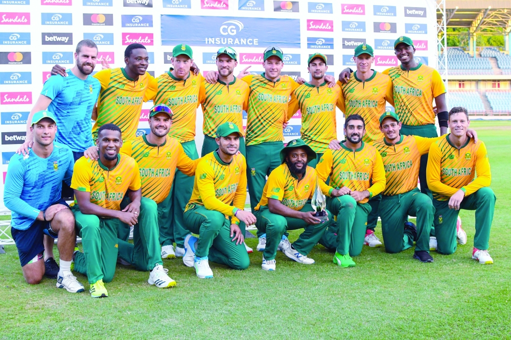 South Africa's players pose with the series trophy. -- AFP
