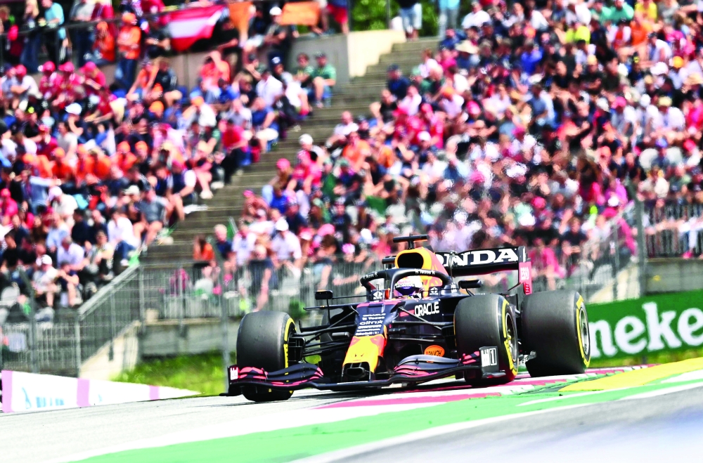 Red Bull's Dutch driver Max Verstappen drives during the Formula One Austrian Grand Prix at the Red Bull Ring race track in Spielberg, Austria, on July 4, 2021. / AFP / Joe Klamar

