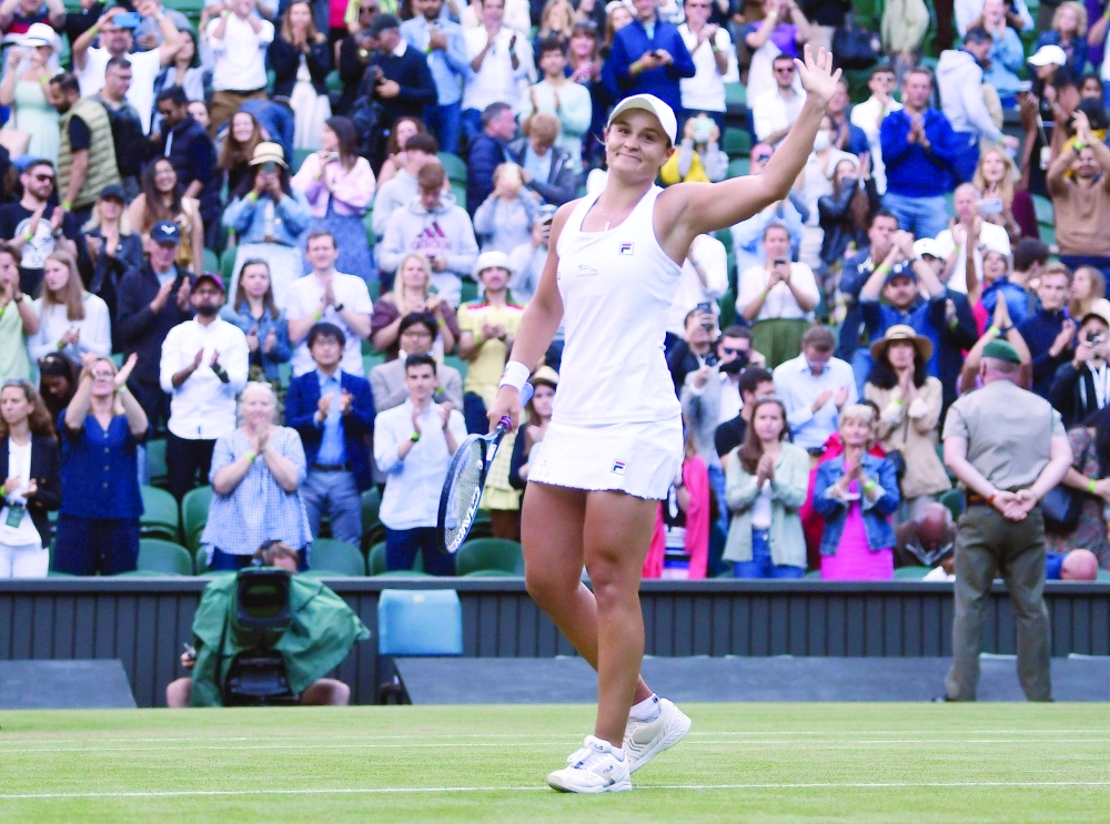Tennis - Wimbledon - All England Lawn Tennis and Croquet Club, London, Britain - July 3, 2021 Australia's Ashleigh Barty celebrates winning her third round match against Czech Republic's Katerina Siniakova REUTERS/Toby Melville
