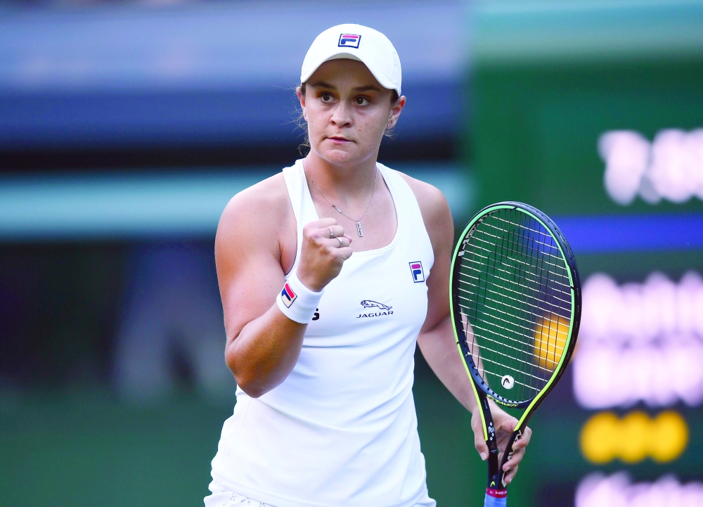 Australia’s Ashleigh Barty celebrates at the All England Club in Wimbledon. — Reuters