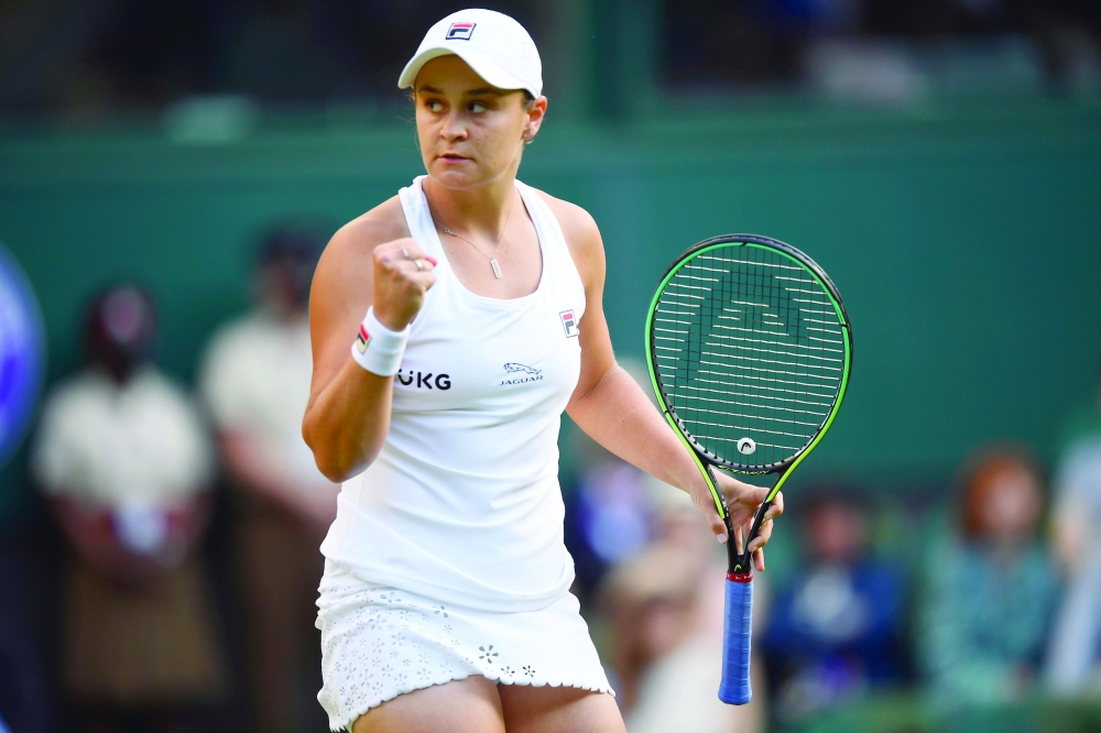 Tennis - Wimbledon - All England Lawn Tennis and Croquet Club, London, Britain - July 3, 2021 Australia's Ashleigh Barty reacts during her third round match against Czech Republic's Katerina Siniakova REUTERS/Toby Melville
