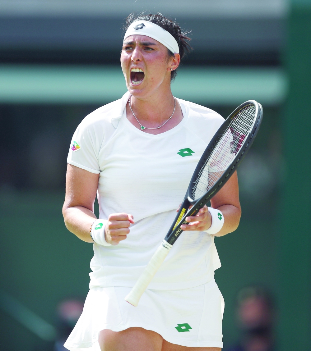 Tennis - Wimbledon - All England Lawn Tennis and Croquet Club, London, Britain - July 2, 2021 Tunisia's Ons Jabeur reacts during her third round match against Spain's Garbine Muguruza REUTERS/Peter Nicholls
