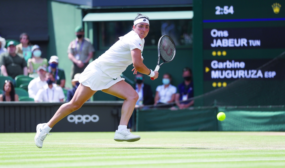 Tennis - Wimbledon - All England Lawn Tennis and Croquet Club, London, Britain - July 2, 2021 Tunisia's Ons Jabeur in action during her third round match against Spain's Garbine Muguruza REUTERS/Peter Nicholls
