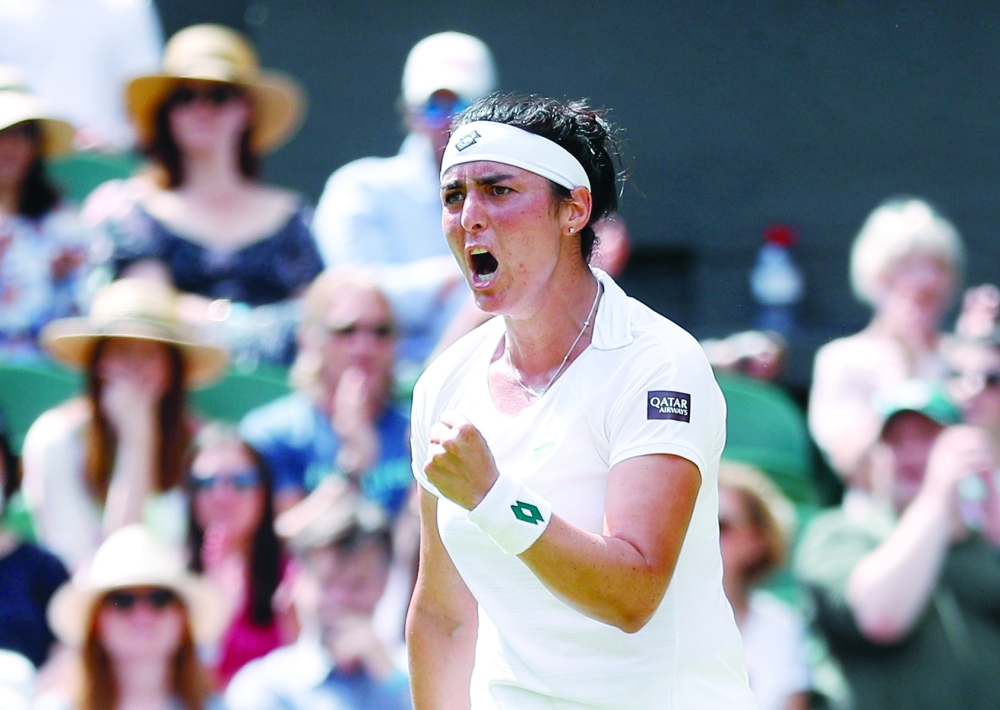 Tunisia’s Ons Jabeur celebrates after the win at Wimbledon. — Reuters