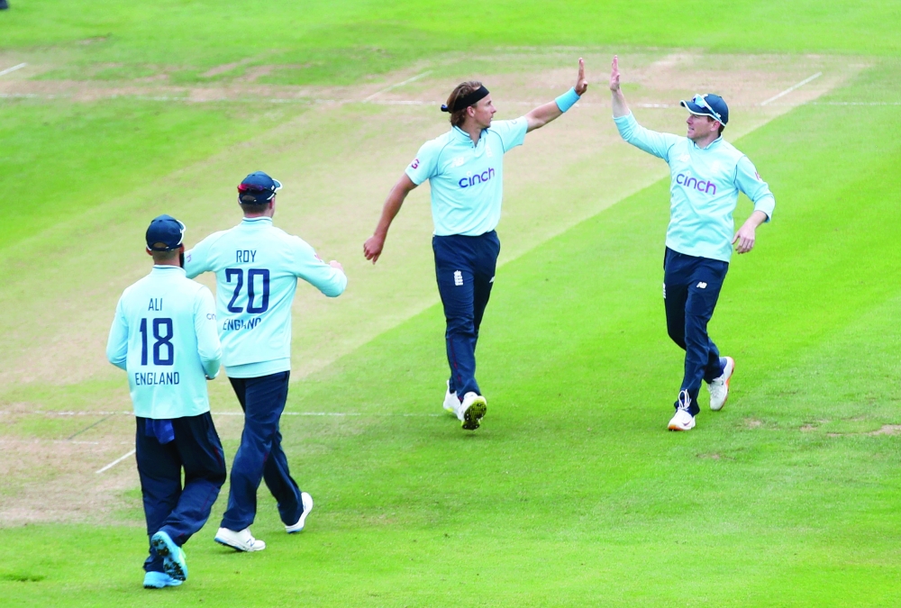 England’s Tom Curran celebrates after taking the wicket of Sri Lanka’s Binura Fernando. — Reuters