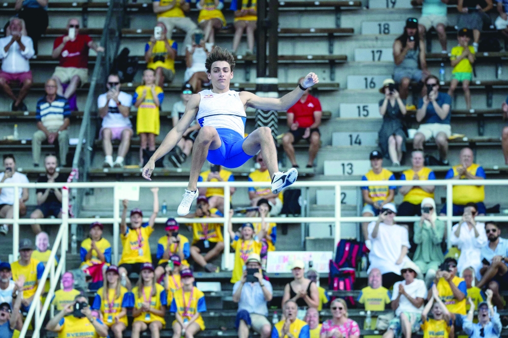 Sweden's Armand Duplantis competes in the men's final pole vault event during the Diamond League Track and Field meeting in Stockholm, on July 4, 2021. Sweden OUT
 / AFP / TT NEWS AGENCY / Christine OLSSON


