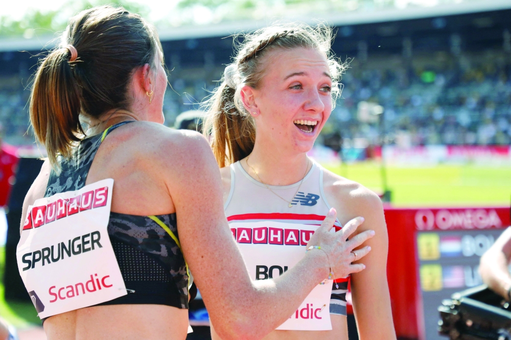 Netherlands’ Femke Bol celebrates winning the 400 metre hurdles competition and sets a new stadium record during the Diamond League meet in Stockholm. — AFP
