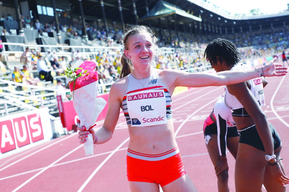 Netherlands' Femke Bol celebrates winning the 400 metre hurdles competition and sets a new stadium record during the Wanda Diamond League Track and Field Championships in Stockholm, Sweden on July 4, 2021.  - Sweden OUT
 / AFP / TT News Agency / Christine OLSSON

