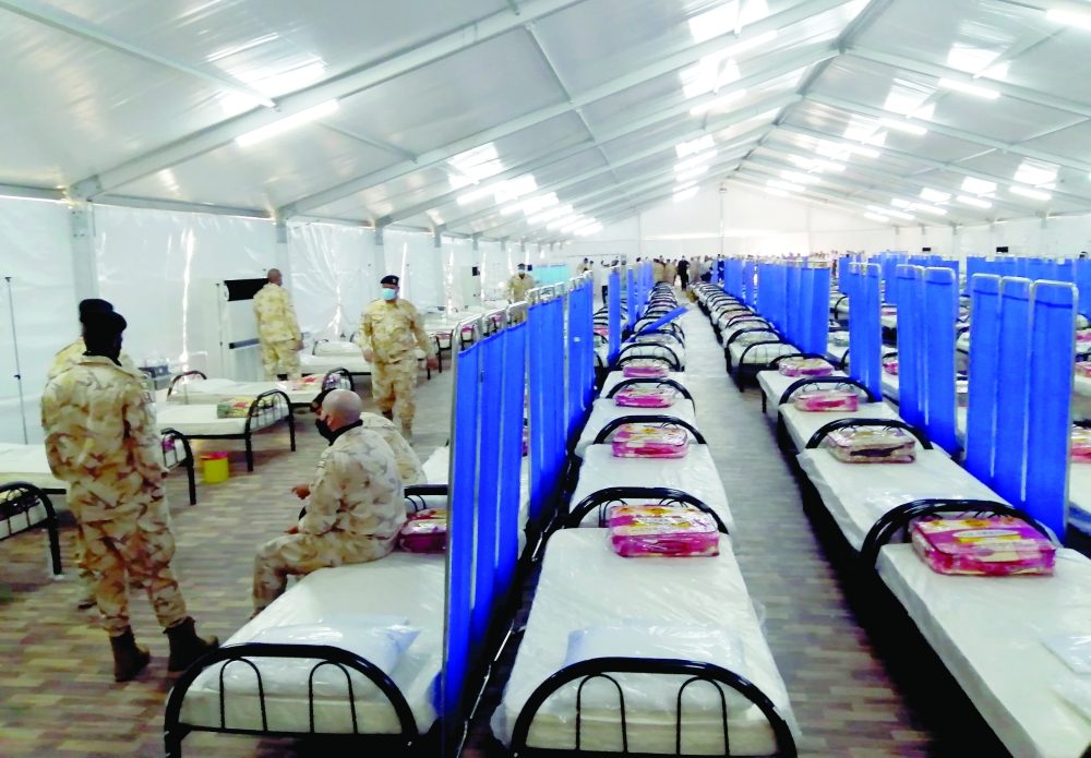 Qatari soldiers gather inside a field hospital donated by Qatar for Covid-19 patients, outside El Yasminet hospital in Ben Arous, Tunsia  on Tuesday. - Reuters