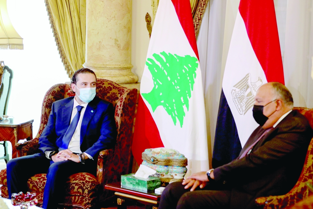 Egyptian Foreign Minister Sameh Shoukry meets with Lebanese Prime Minister-designate Saad al Hariri at Tahrir Palace in Cairo, Egypt on Wednesday. - Reuters