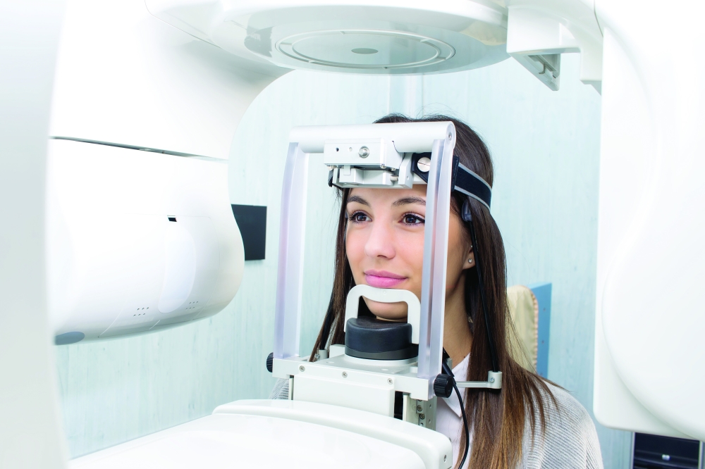 Close,Up,Head,Shot,Of,Girl,Taking,Dental,Tac,With