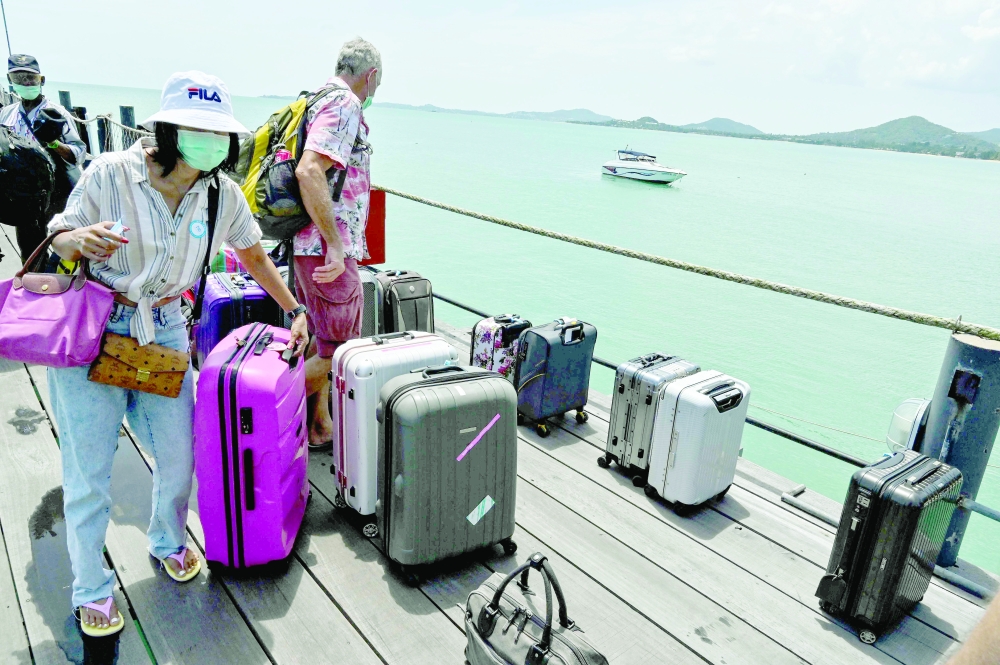 Samui, Tao and Phangan welcomed visitors as part of the kingdom's push to revive its battered tourism industry. -- AFP
