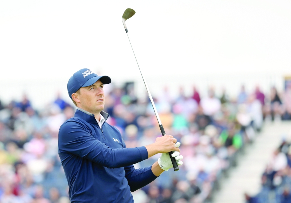 Jordan Spieth of the US tees off on the 16th hole during the first round. --  Reuters