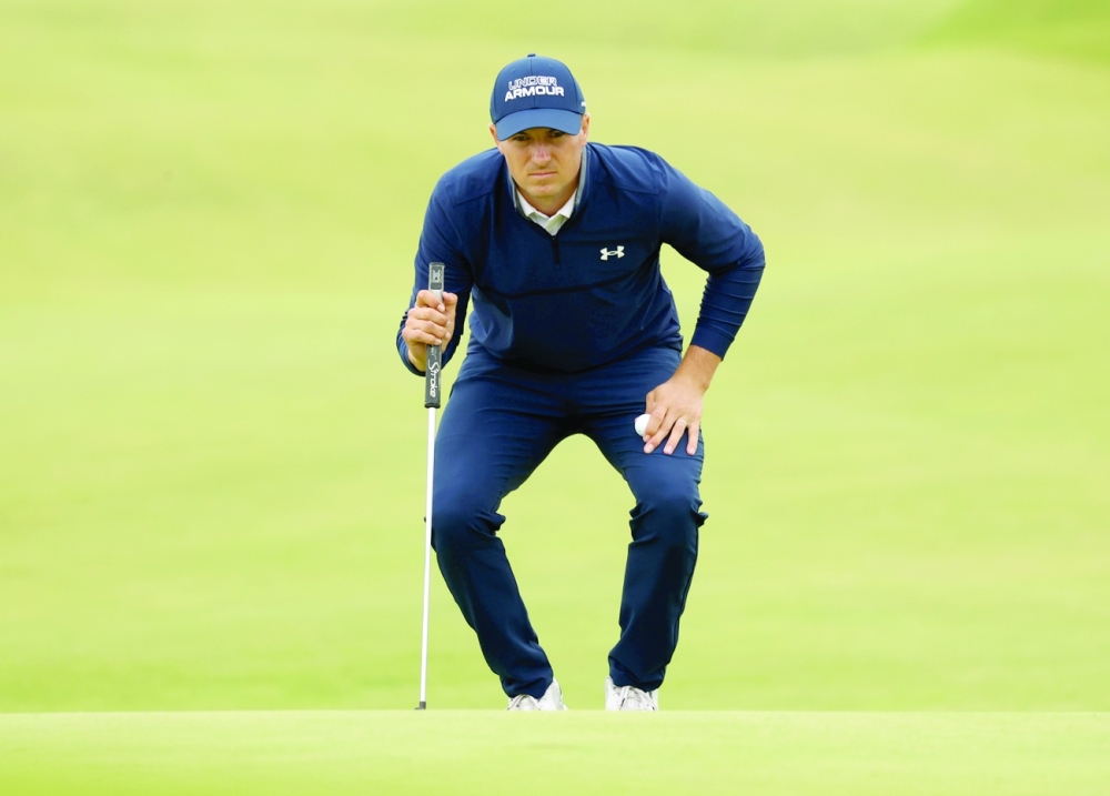 Jordan Spieth of the US on the 18th green during the first round. --  Reuters