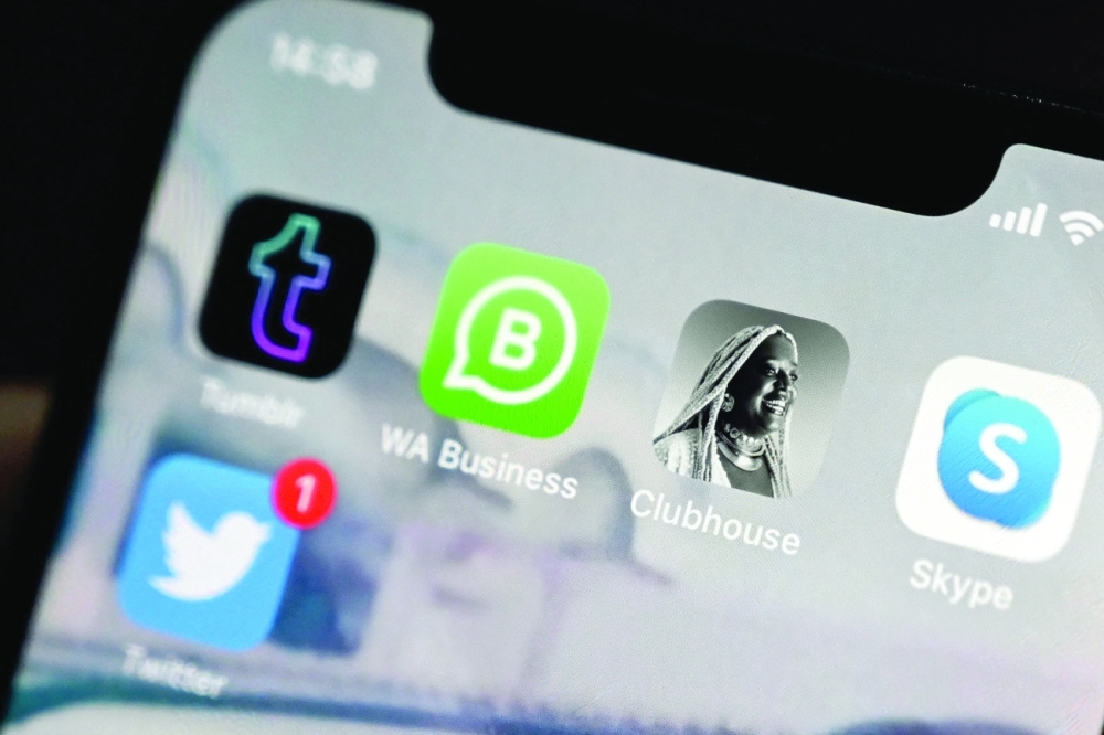 This photo illustration shows the Clubhouse app icon (2nd R) on a mobile phone screen. - AFP  