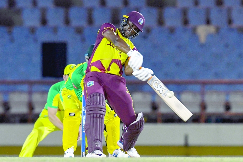 Evin Lewis of West Indies hits a six during the 5th and final T20I. -- AFP