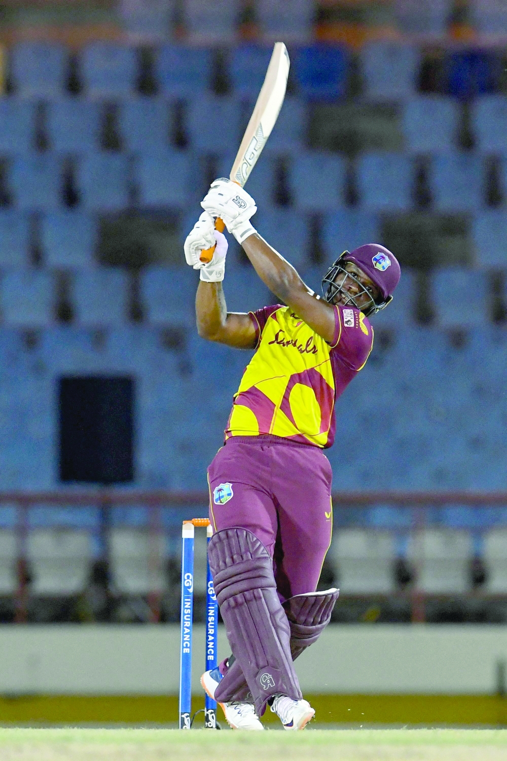 Evin Lewis of West Indies hits a six during the 5th and final T20I. -- AFP