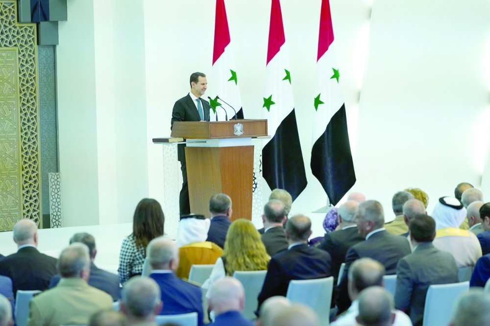 Bashar al Assad takes the presidential oath for a fourth term, in Damascus, in this handout released by SANA on Saturday. - Reuters