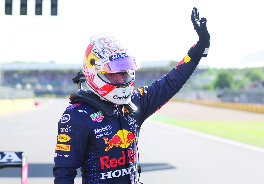 Red Bull's Max Verstappen celebrates after winning the qualifying sprint for British GP at Silverstone Circuit. -- Reuters
