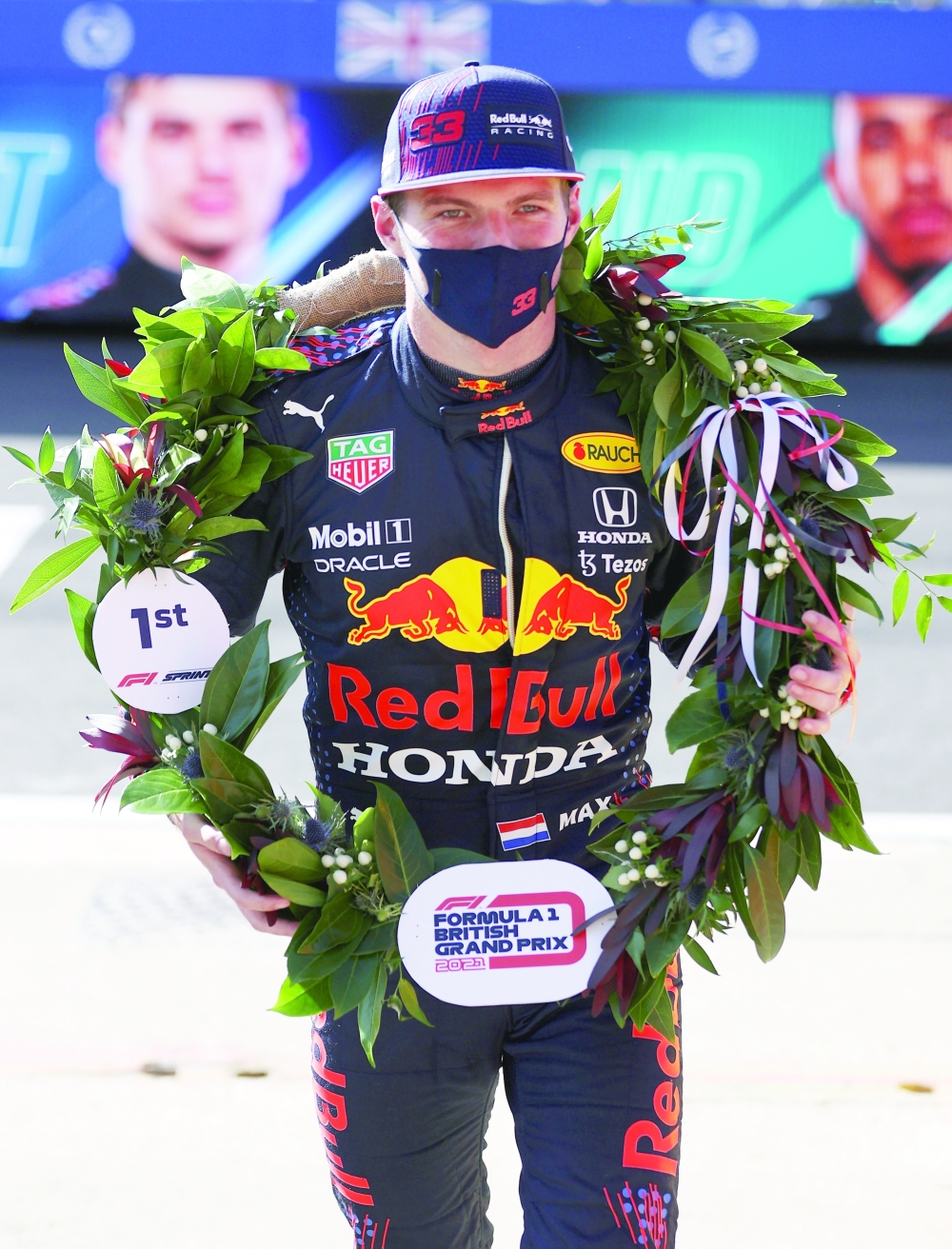 Red Bull's Max Verstappen celebrates after winning the qualifying sprint for British GP at Silverstone Circuit. -- Reuters