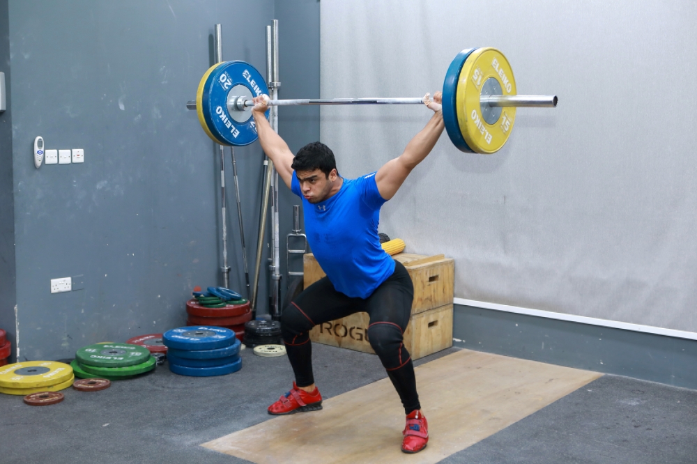 Gaza weight-lifter Mohammad Hamada who is the first Palestinian to compete in the game. -- Reuters