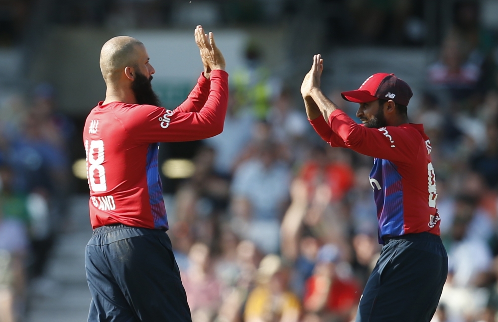 England's Moeen Ali celebrates taking the wicket of Pakistan's Fakhar Zaman. 
-- Reuters