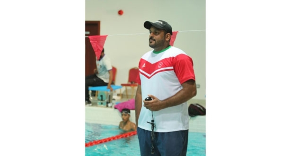 Swimming coach Ayman al Kalaibi