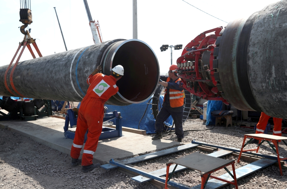 Workers are seen at the construction site of the Nord Stream 2 gas pipeline, near the town of Kingisepp, Leningrad region. - Reuters File Photo
