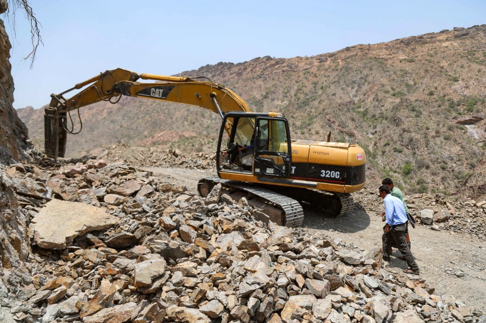 Construction of a road that will serve as a lifeline between Taez, besieged by Ansar Allah, and the southern city of Aden, the internationally recognised government's temporary capital. - AFP