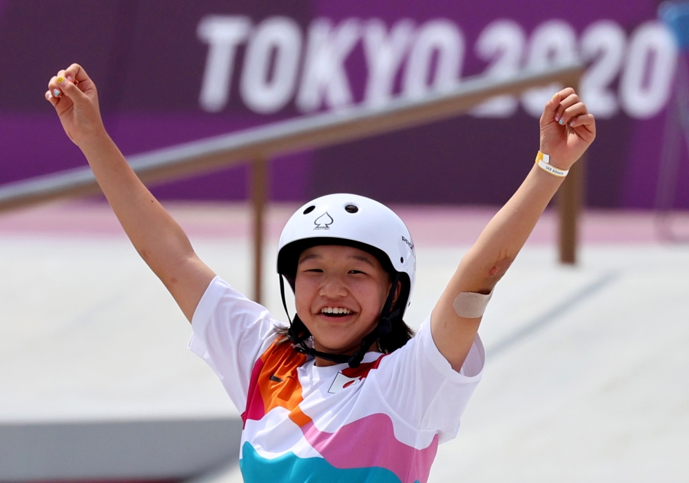 Gold medalist Momiji Nishiya of Japan celebrates.
