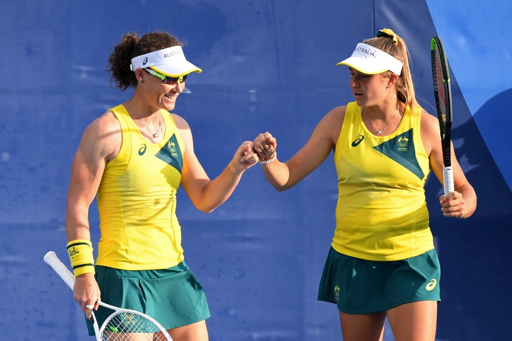 Ellen Perez of Australia and Samantha Stosur of Australia celebrate during their second-round match against Monica Niculescu of Romania and Raluca Olaru of Romania
