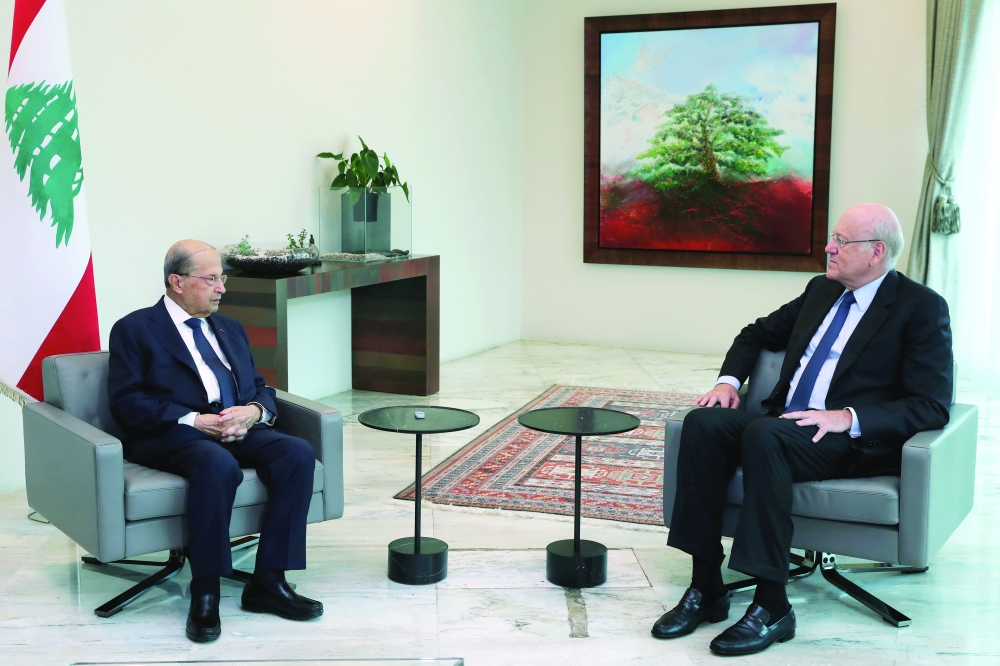 Lebanon's President Michel Aoun meets with businessman Najib Mikati at the presidential palace in Baabda, Lebanon. - Reuters