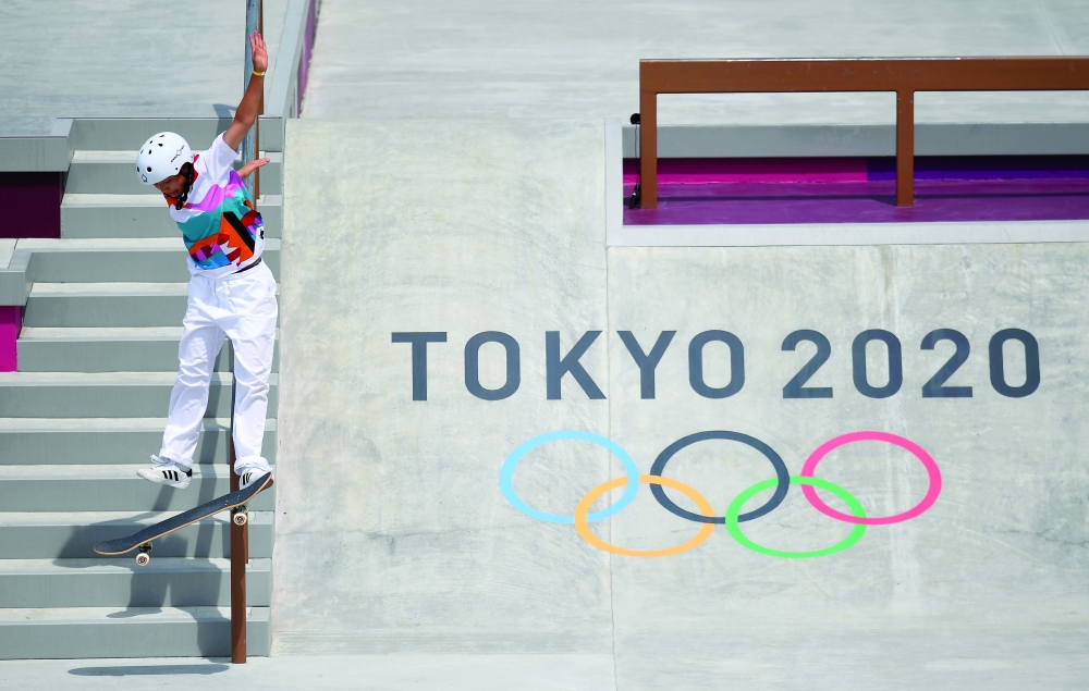 Momiji Nishiya of Japan takes part in skateboarding women's street first round. -- Reuters 